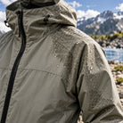 Storm Shell — Crocodile, Sage Gray — worn outdoors