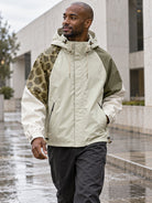 Storm Shell — Giraffe, Dusty Olive — worn outdoors