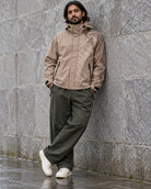 Storm Shell — Lion, Soft Taupe — worn outdoors