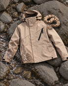 Storm Shell Python 2 — Warm Taupe — in water, with the python (post 91)
